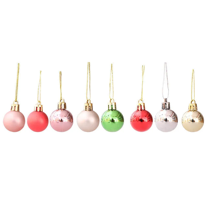 Boxed set of 24 plastic Christmas tree decorations in gold, silver, red, green, champagne gold, and rose gold.