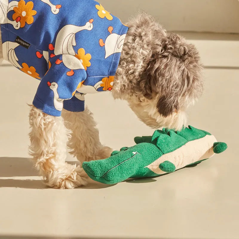 Green cotton plush dog toy measuring 35cm long by 18cm wide