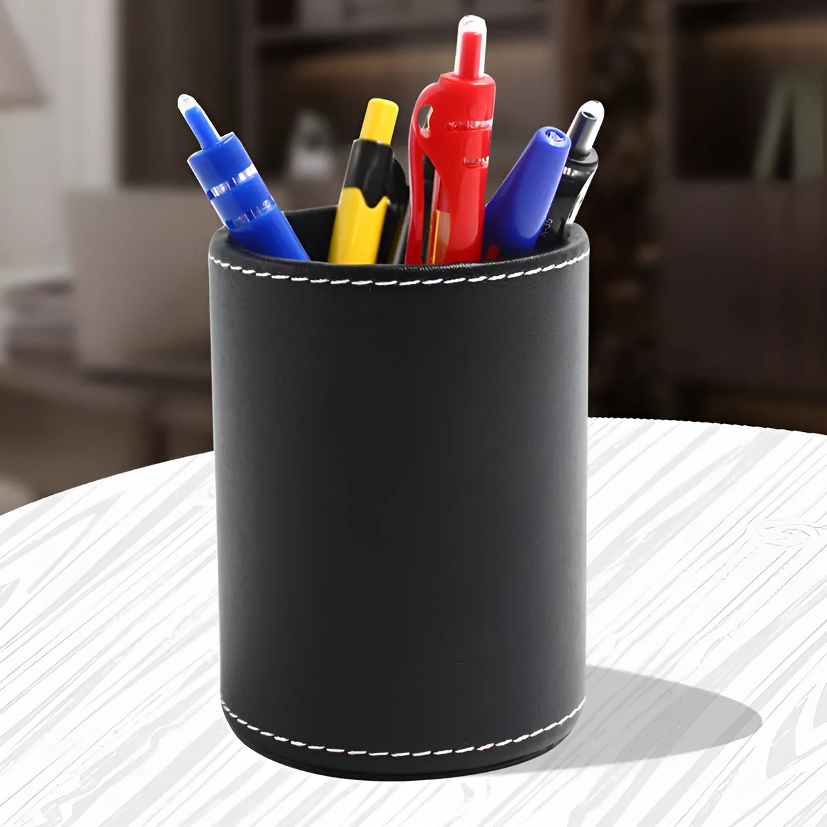 Black leather round pen holder showing cylindrical shape with 8.0cm diameter and 10.8cm height dimensions