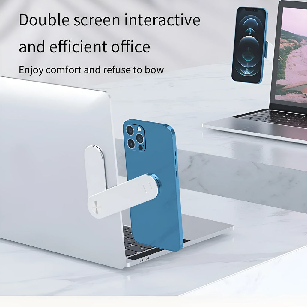 Black aluminum laptop phone holder mounted beside computer monitor showing smartphone attachment