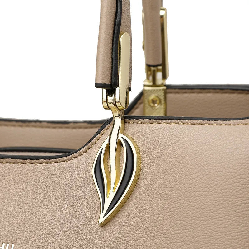 Women's black PU leather shoulder messenger bag with multi-layer compartments and sewing thread detailing