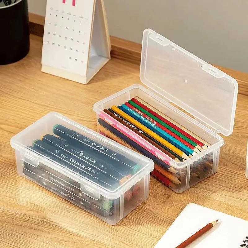 Transparent plastic stationery storage box for pencils, crayons, and art supplies