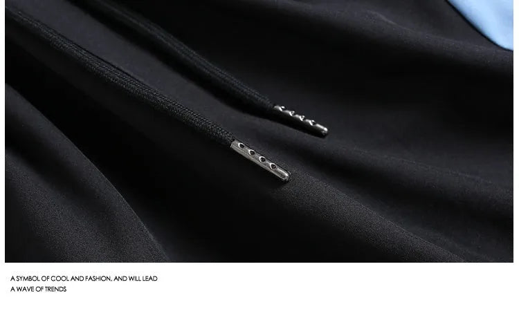 Men's loose fit quick-drying sports shorts in grey with elastic waist, shown above the knee.