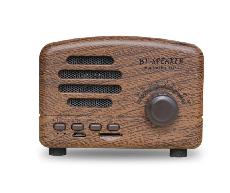 Vintage style Bluetooth speaker in wood grain finish showing front grille and compact size.