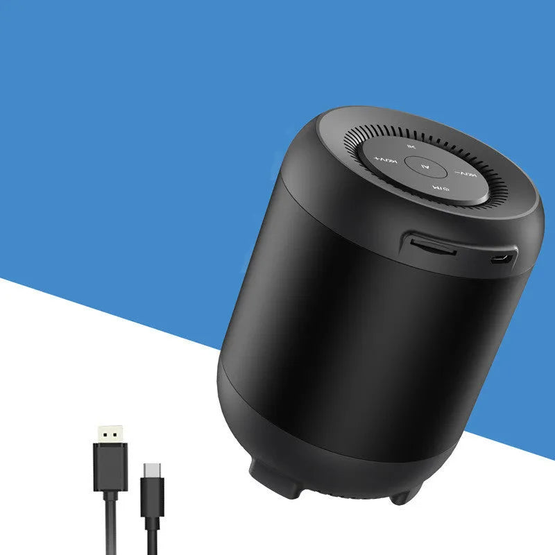 Black and white Bluetooth speaker with AI voice control features and circular plastic housing