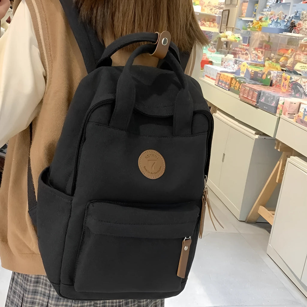Black Oxford cloth retro backpack with curved shoulder straps