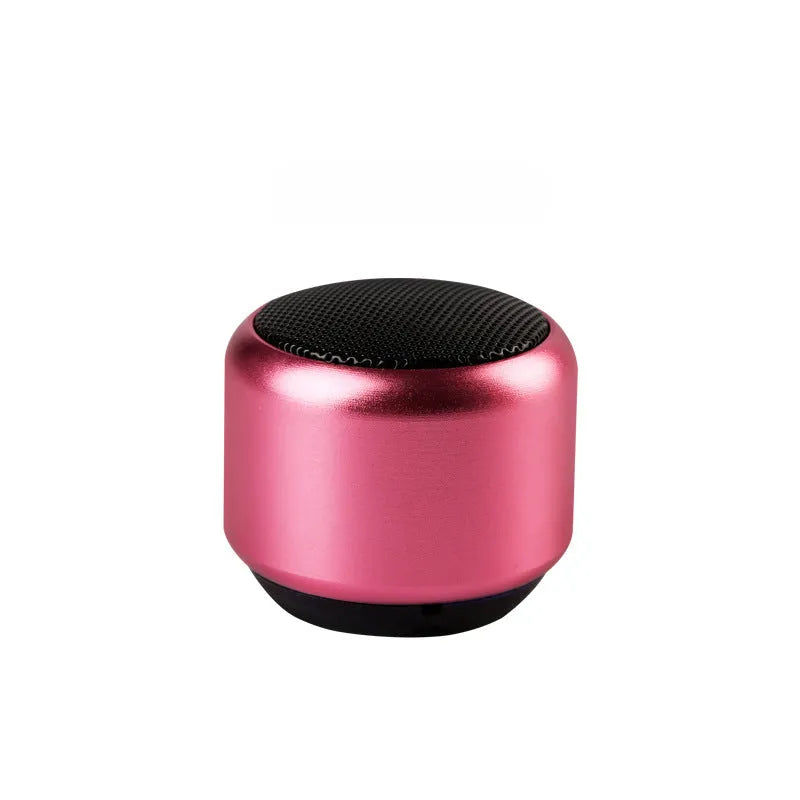 Small portable Bluetooth speaker in black, blue, gold, or pink colour options.
