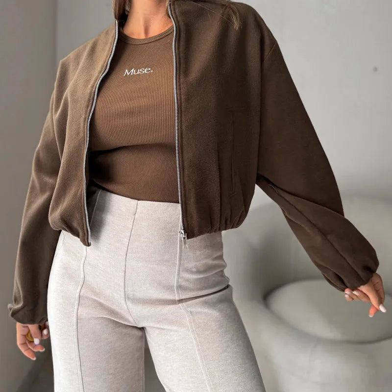 Women's off-shoulder coat with lantern sleeves in brown colour showing round neck design and pocket detail