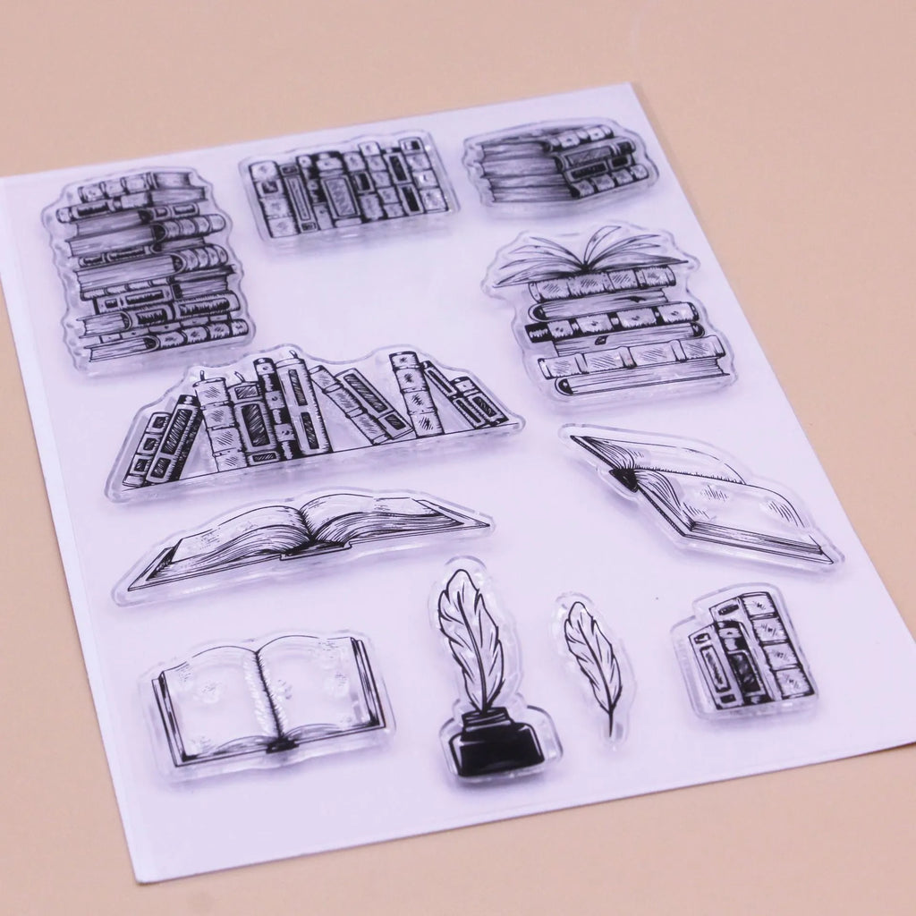 Transparent silicone stamp with a raised white seal pattern, measuring 11 by 16 centimetres.