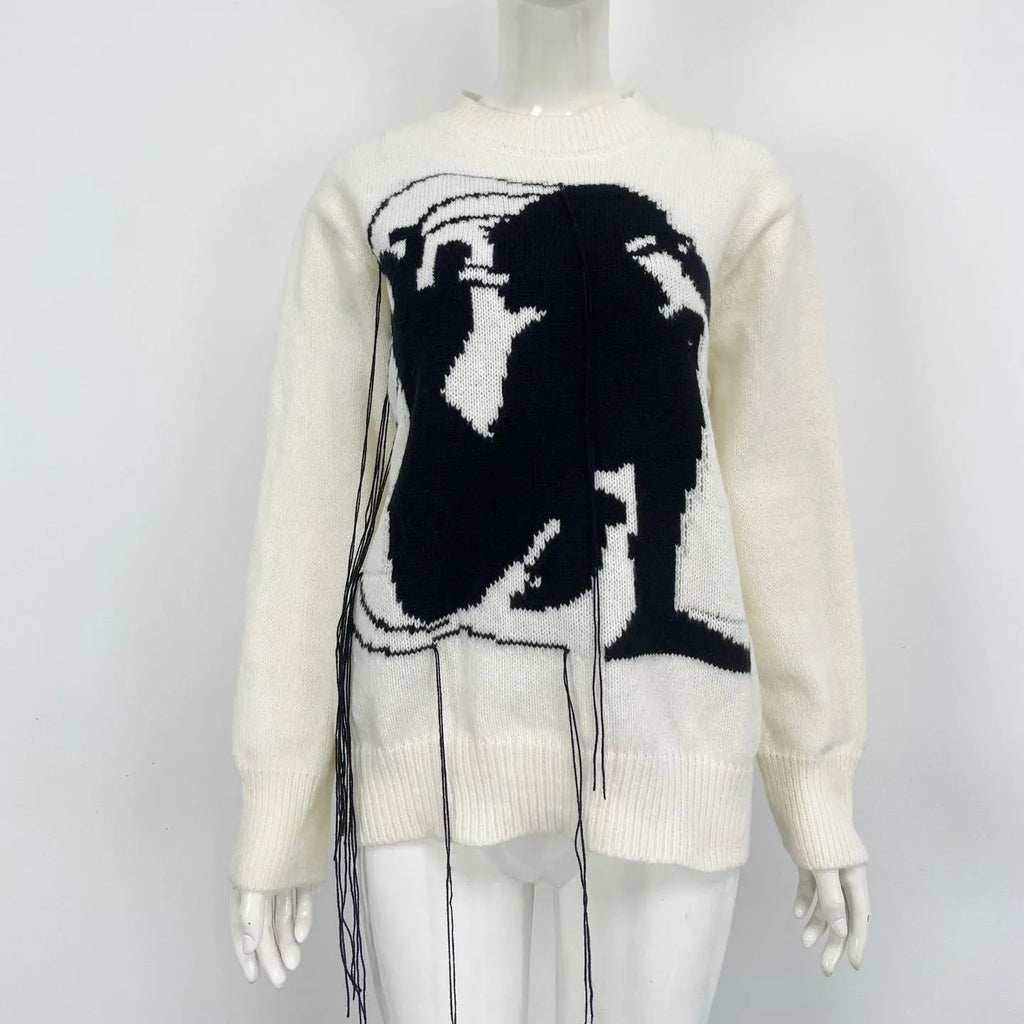 Women's loose alpaca wool sweater with abstract pattern and tassel detailing in street fashion style