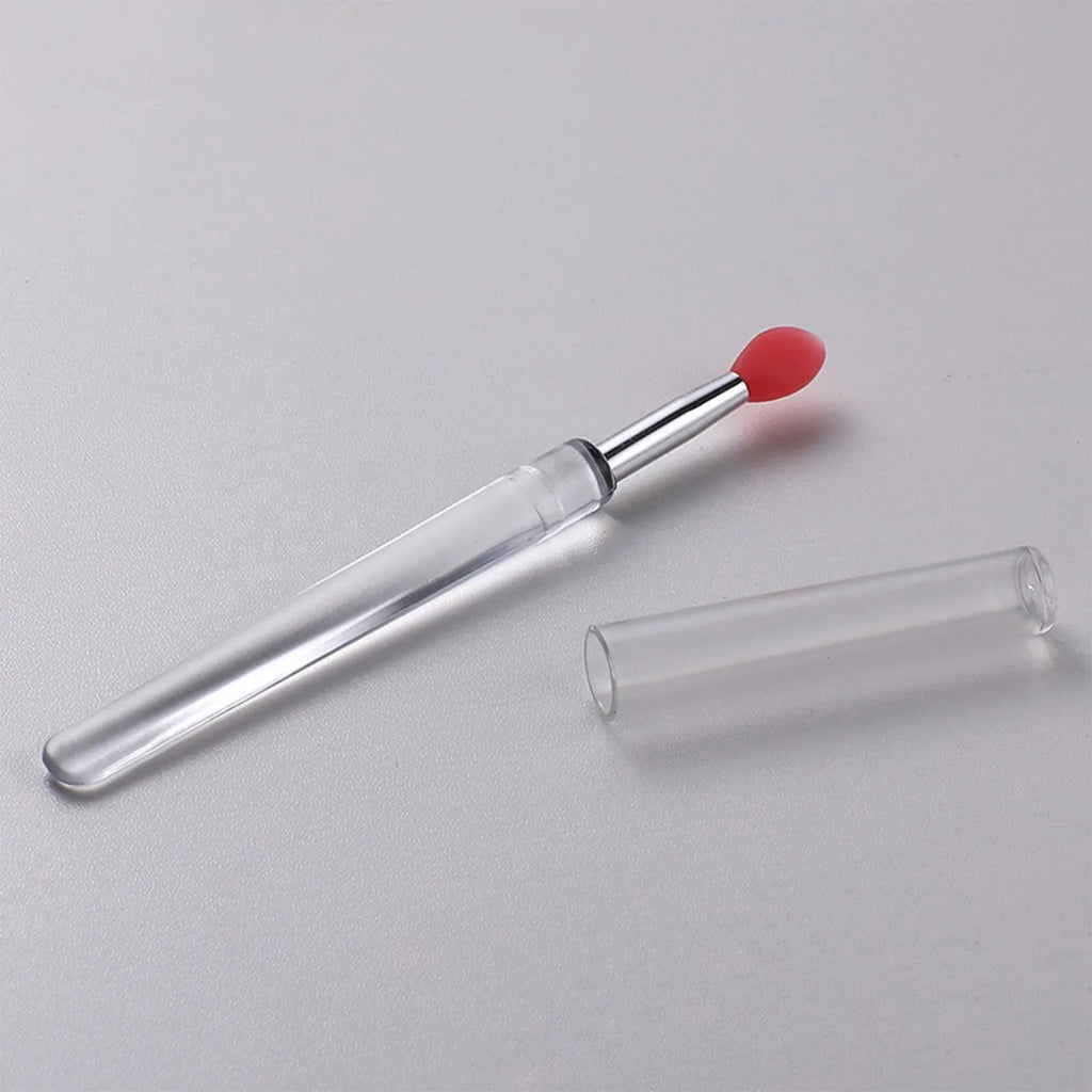 Reusable silicone lip brush with protective cap in one of eight colour options