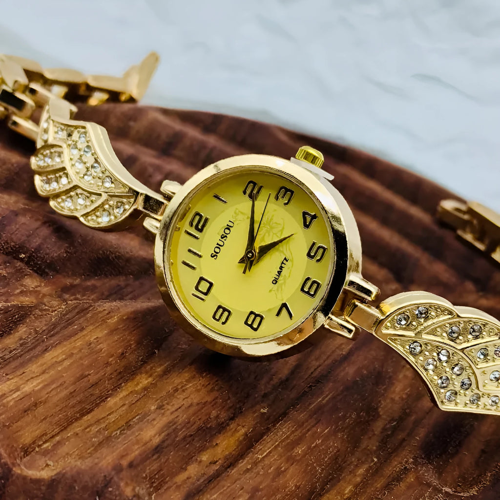 Women's stainless steel watch with round dial and Vachette clasp, shown in gold colour option.