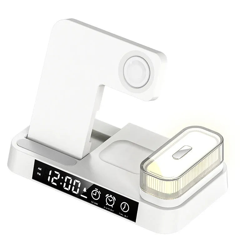 White 4-in-1 wireless charging station with foldable phone stand, LED clock display, and Apple Watch cable.