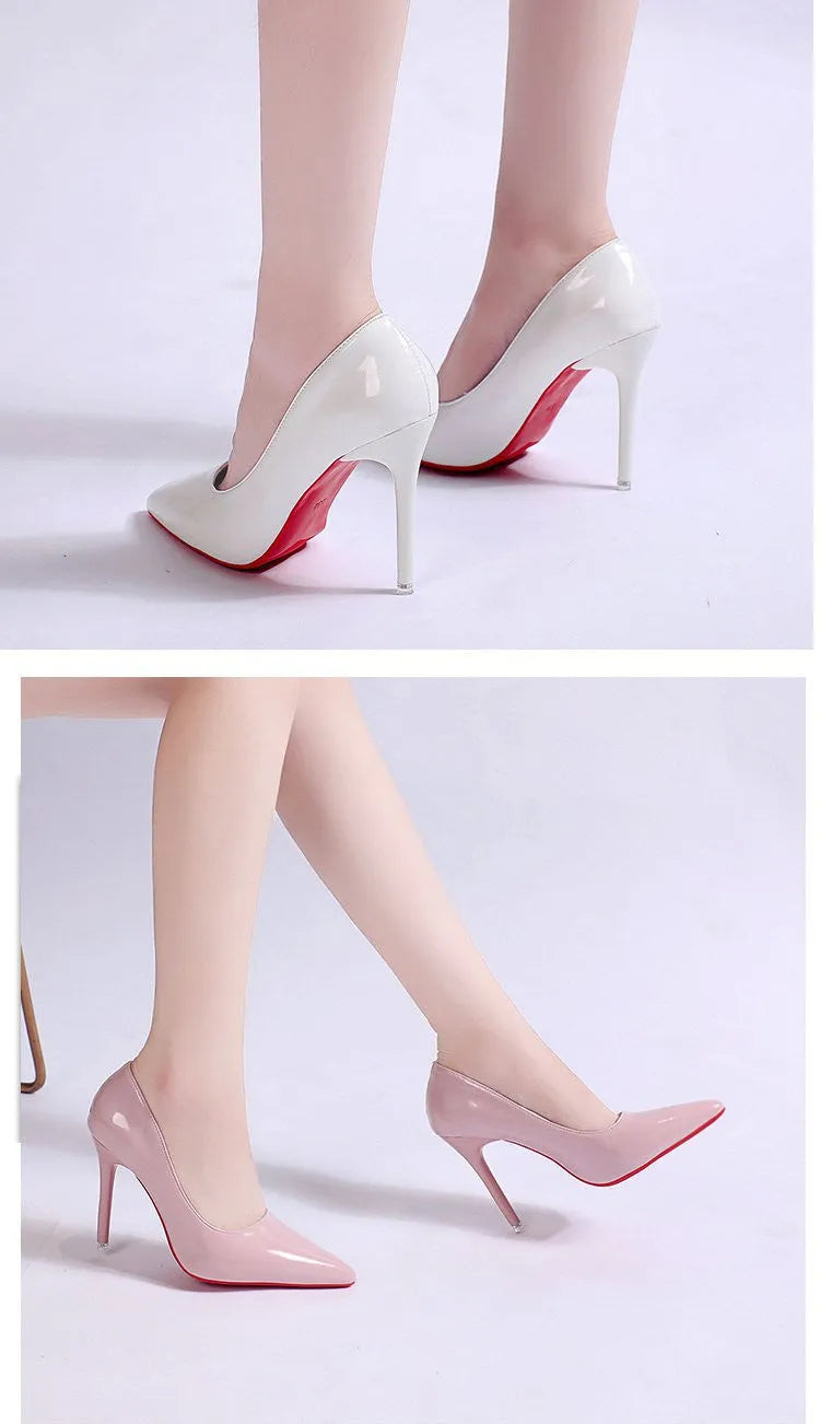 Women's black stiletto heel pointed toe pump shoe on a white background.