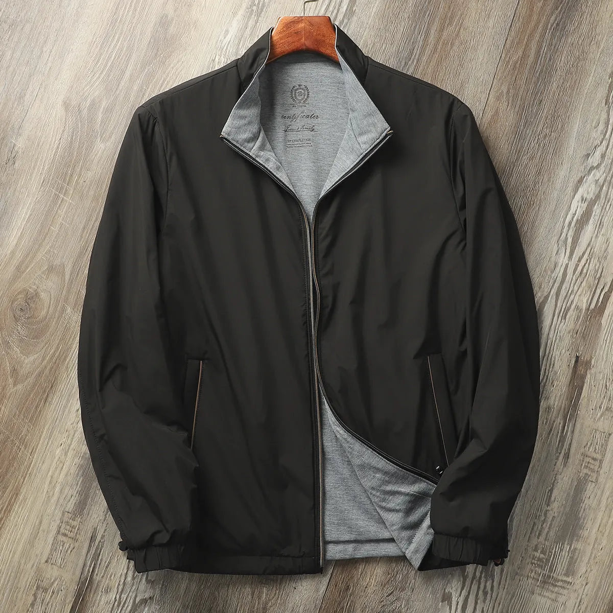 Men's stand collar casual jacket in polyester blend shown in army green colour.