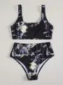 Women's high-waist bikini set with marble tie-dye print and U-neck top.
