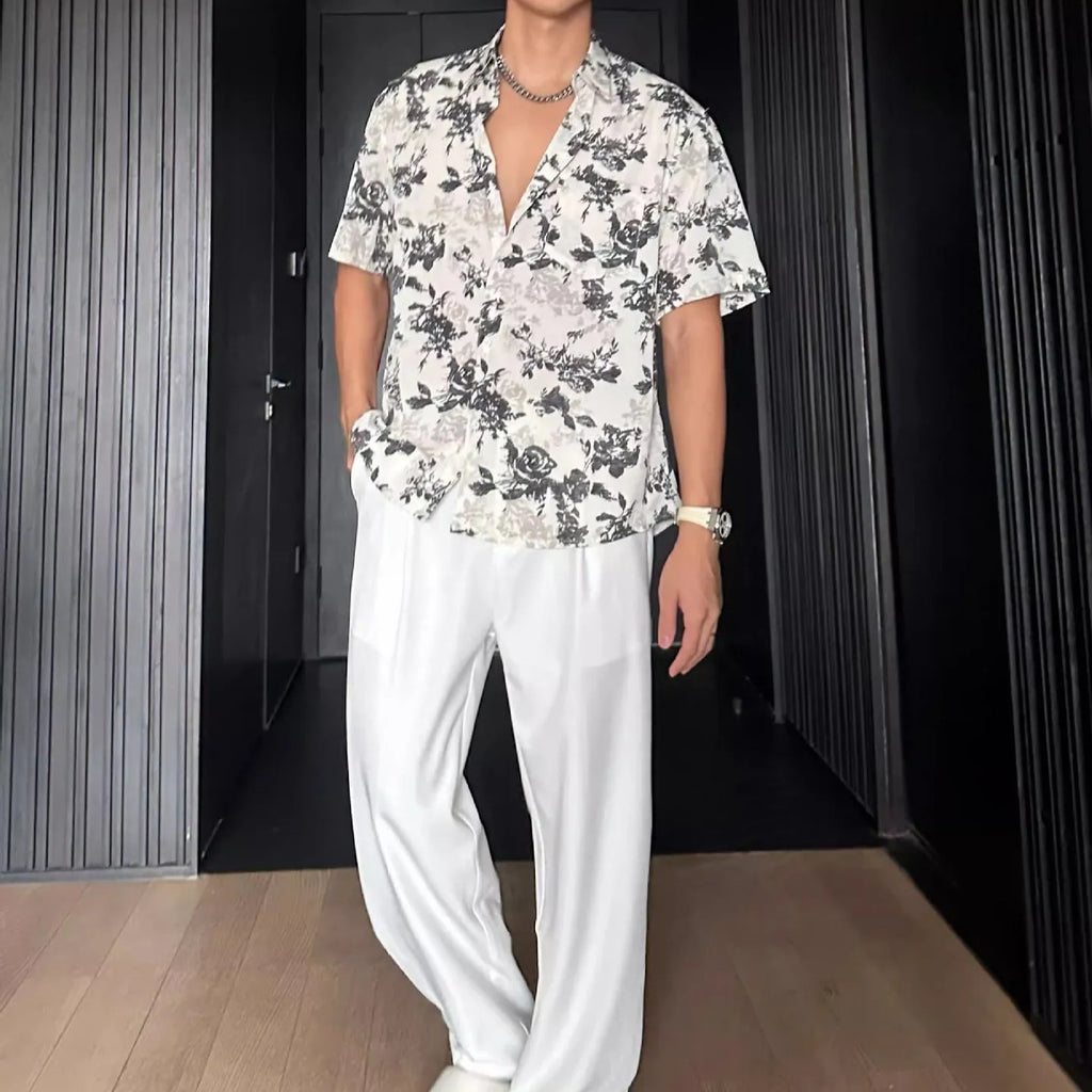 Men's loose-fit printed short sleeve shirt with pendant detail and floral pattern in white or black colours