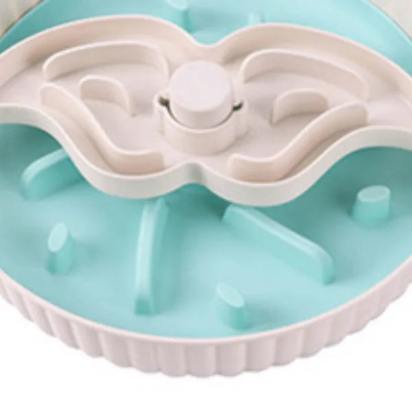 Pet slow feeder bowl with silicone licking mat in rotating game board design