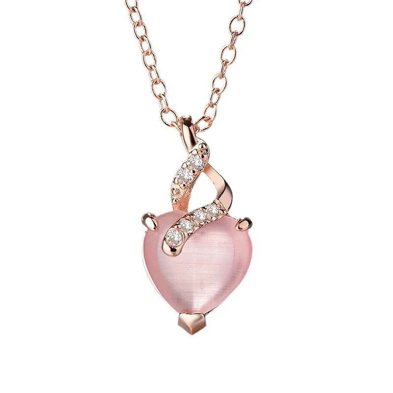 Women's heart-shaped pink crystal pendant necklace with rose gold electroplated cross chain