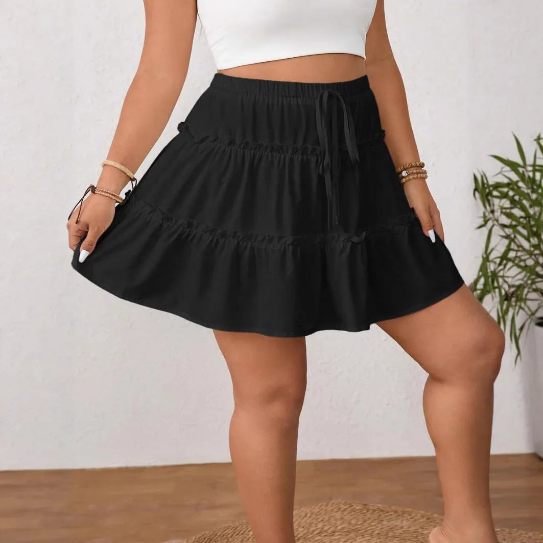 White pleated A-line short skirt with lace-up adjustable waist in milk silk sanding fabric