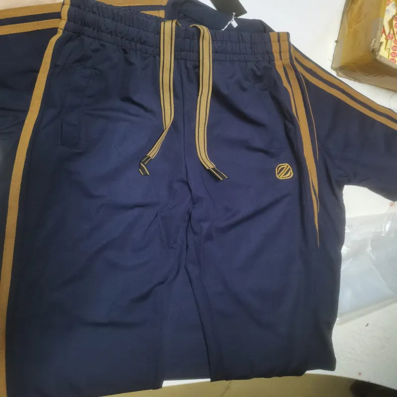 Men's blue ironing-free short sleeve polyester sports suit consisting of a top and pants