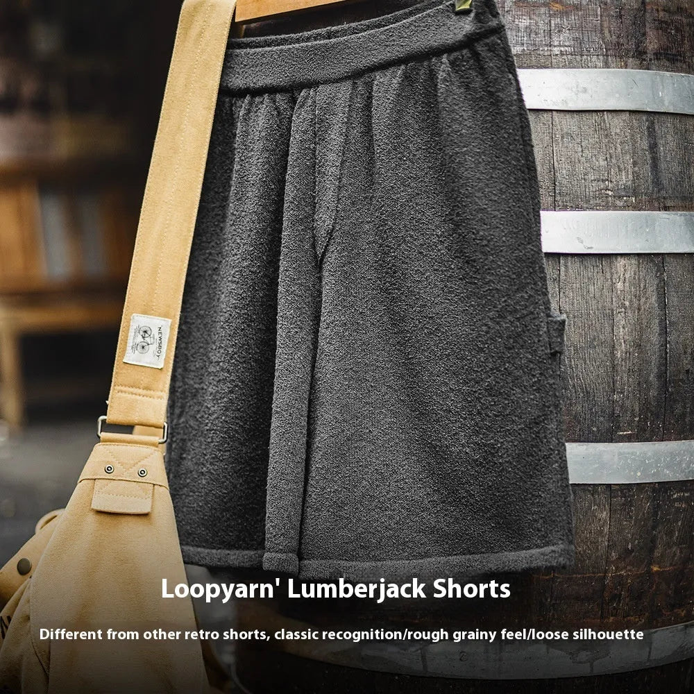 Cement grey polyester sports shorts with straight-leg design and medium elastic waistband