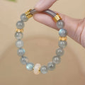 Emerald green Tian Shan Cui jade women's half bracelet with floating flower girl design and round beads