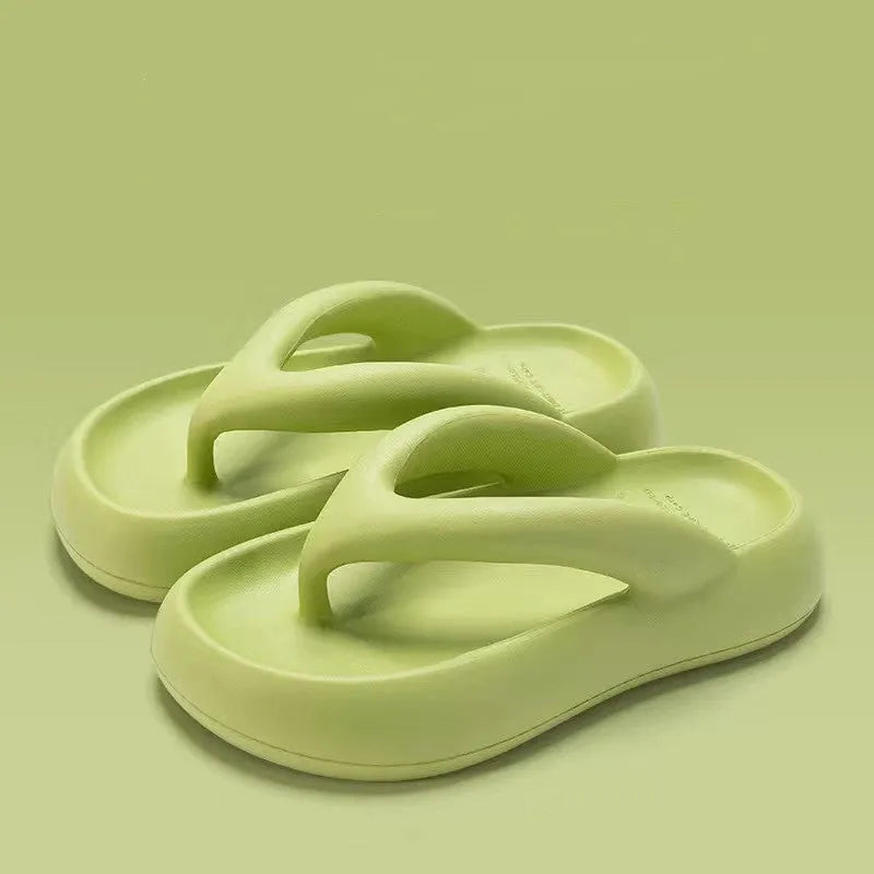 Solid colour thick-soled EVA flip-flops with a bow detail on the strap.