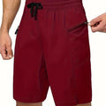 Men's solid colour quick-drying beach shorts in straight-leg polyester fabric