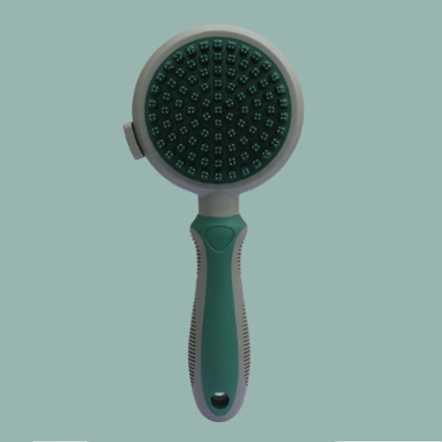 Double sided pink cat grooming brush with release button showing brush and flea comb sides