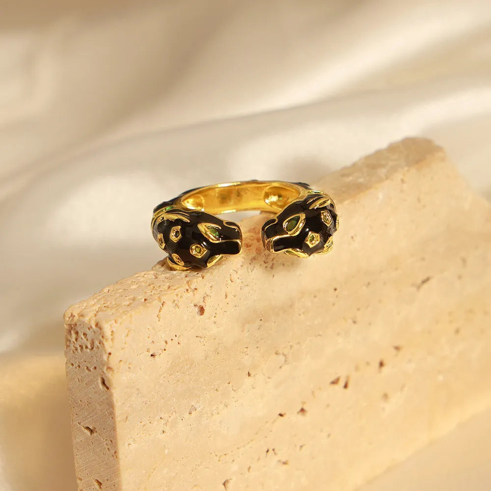 Copper open ring with electroplated black cheetah pattern in geometric shape, size 7