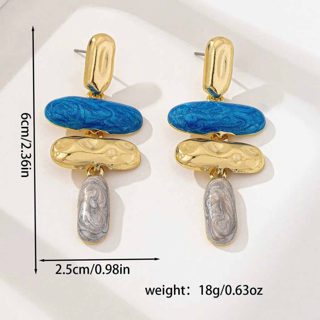Geometric multicolor stud earrings for women with electroplated finish and simple design.