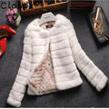 Artificial fur street fashion top in beige colour with regular sleeves and short length
