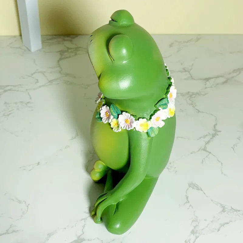 Magic Yoga Frog plastic and resin ornament in RDW123 colour on a shelf.