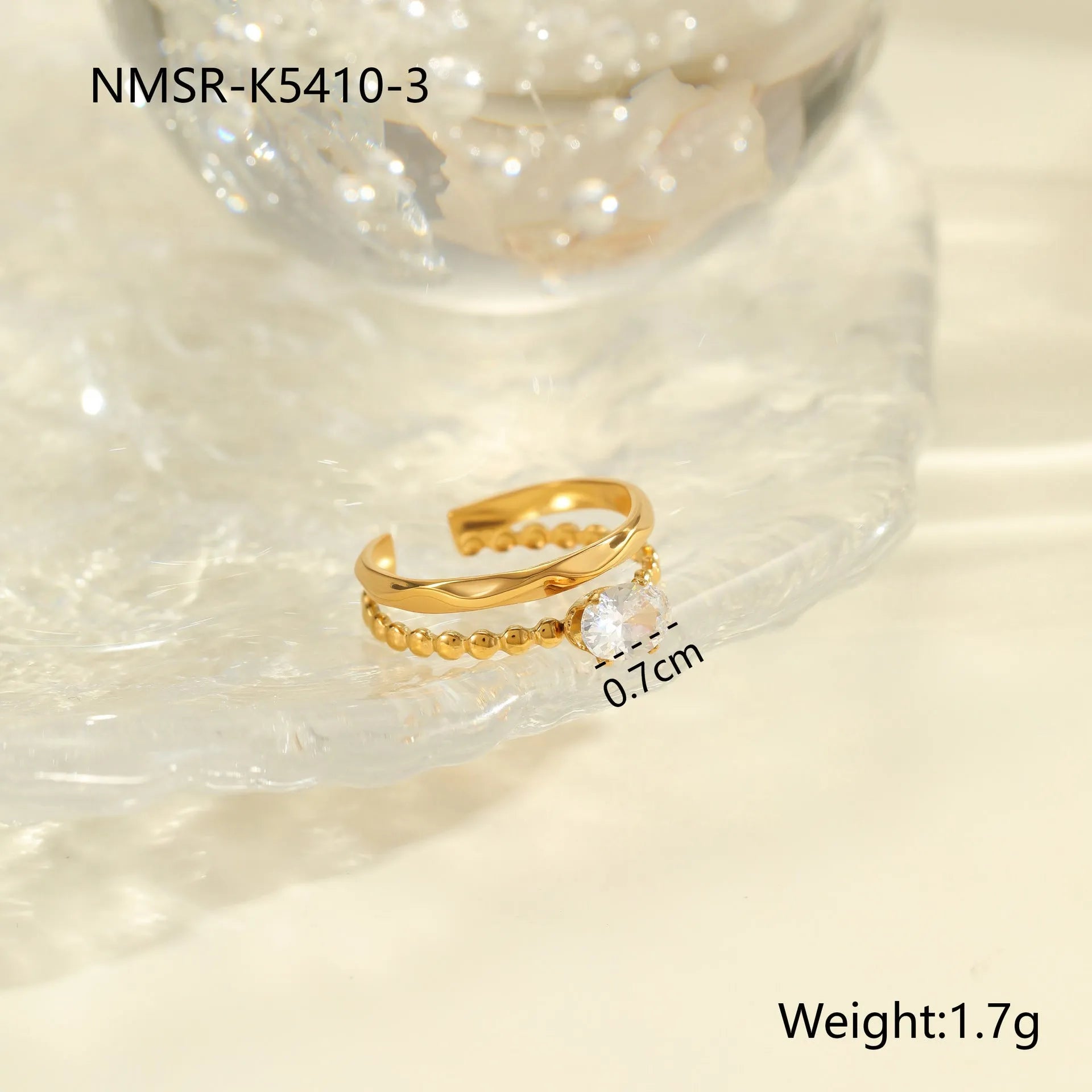 Gold electroplated stainless steel ring with geometric heart shape design and zircon accents