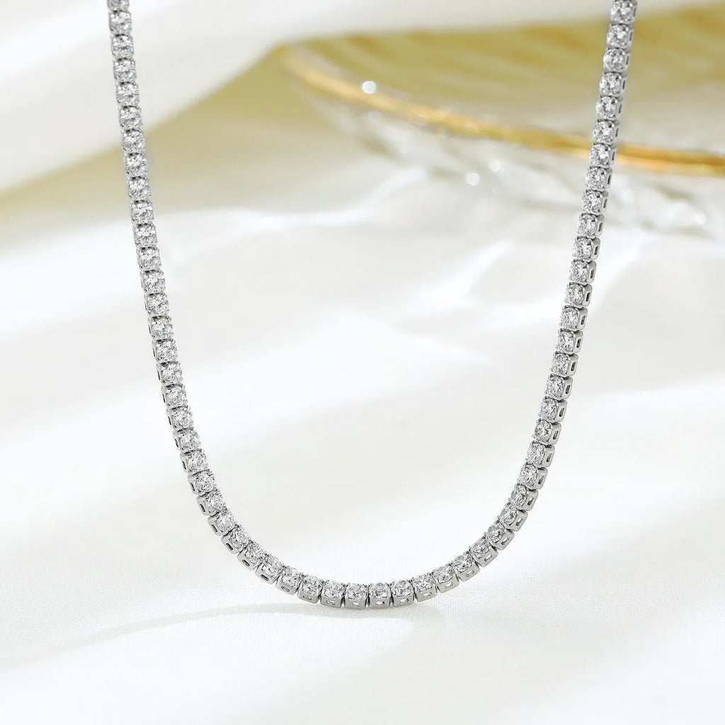 Women's sterling silver necklace with round pendant and diamond-like treatment