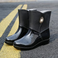 Women's middle tube PVC rain boots in purple, black or beige with non-slip soles