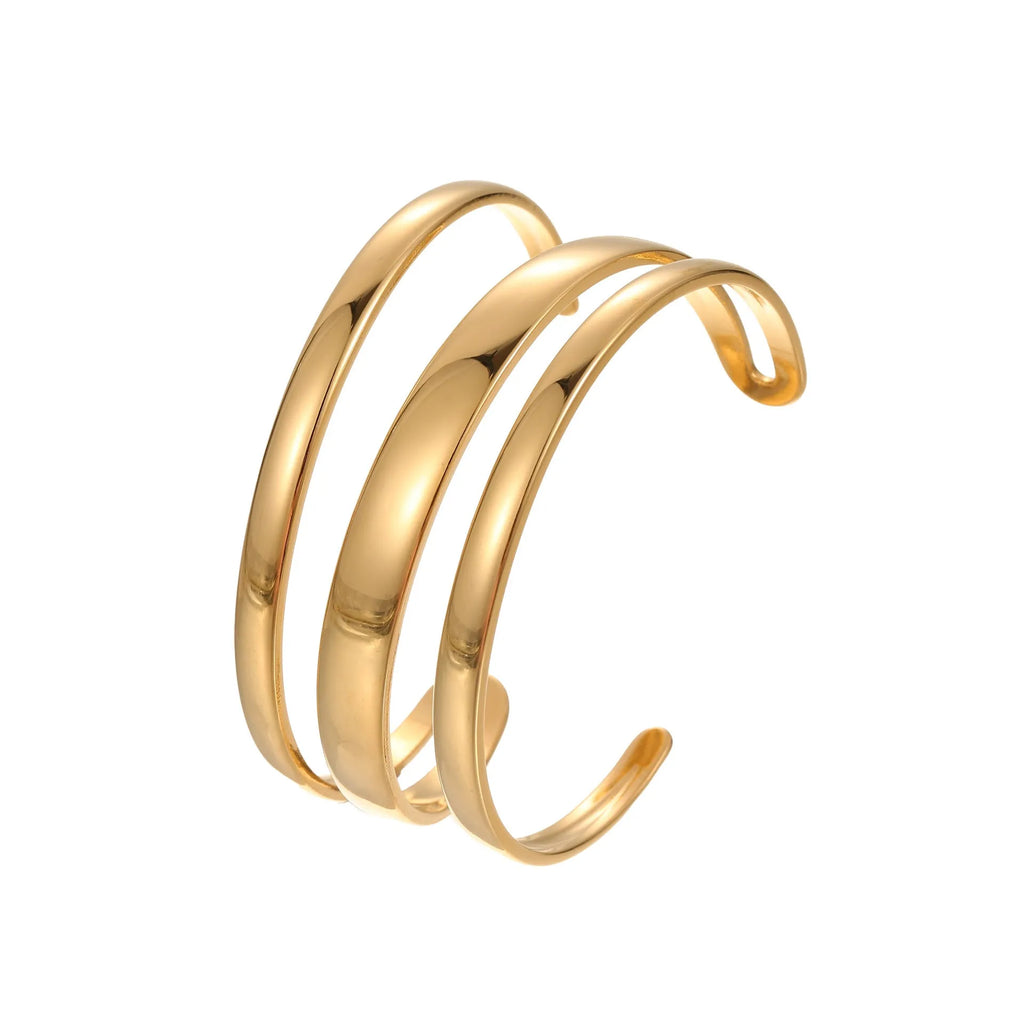 Geometric line stainless steel bracelet for women in gold tone or steel finish.
