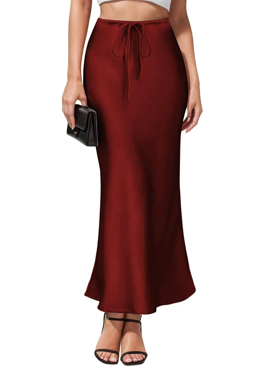 High-waisted acetate satin asymmetric skirt in a solid colour on a model