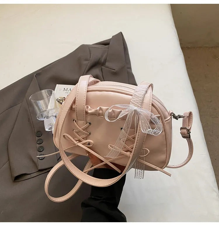 Women's bandage bow PU leather handbag with shoulder strap and internal phone compartment