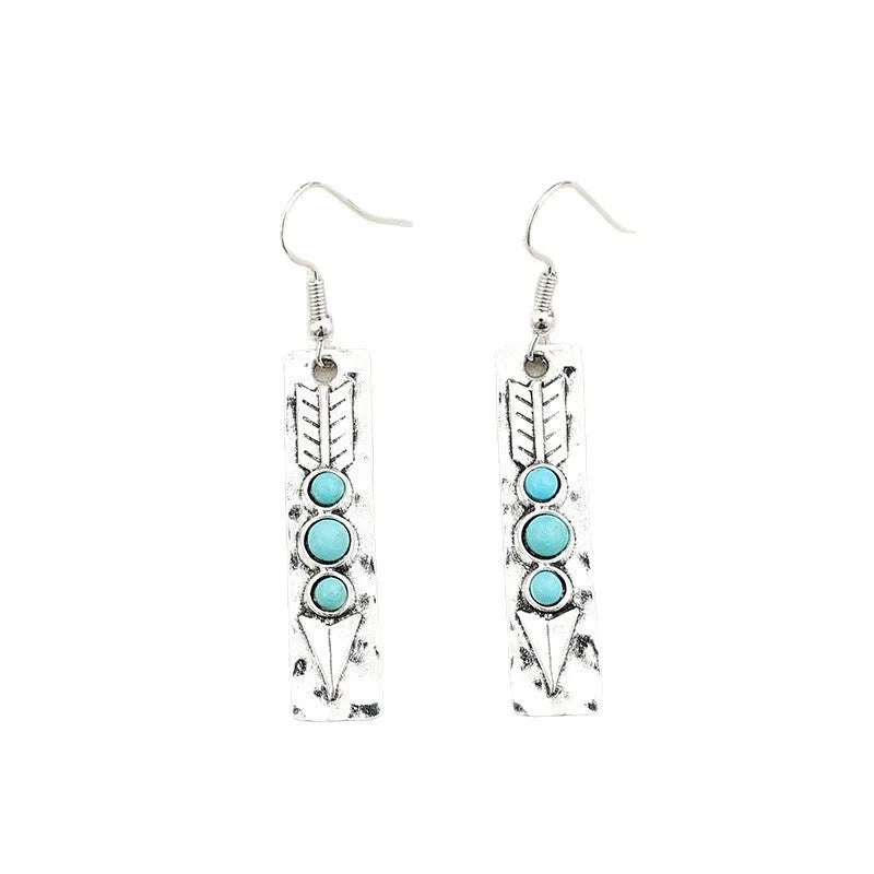 Long strip silver earrings with geometric shape and turquoise colour inlay