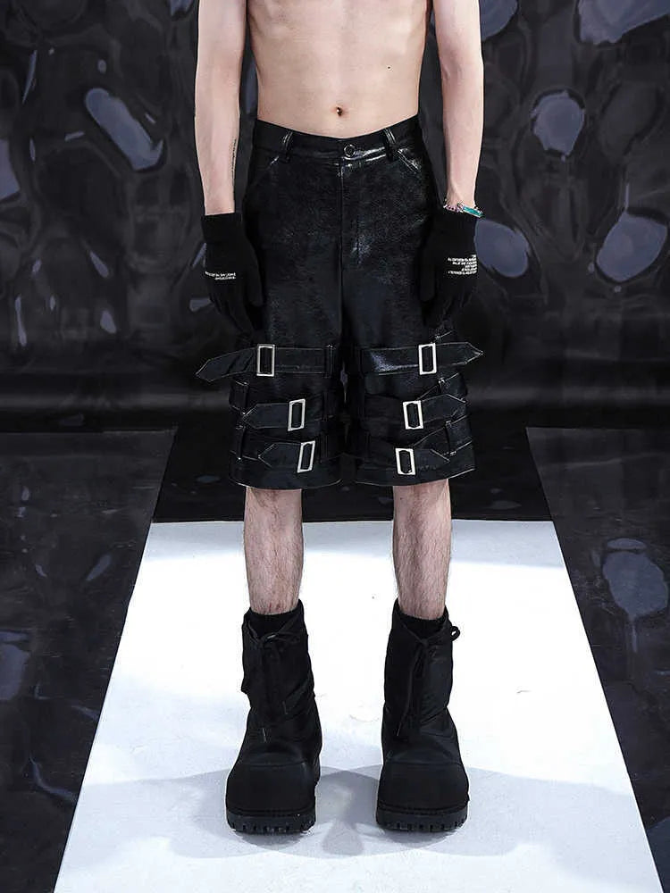 Men's black PU leather cropped shorts with medium-low waist design and leather ring detailing