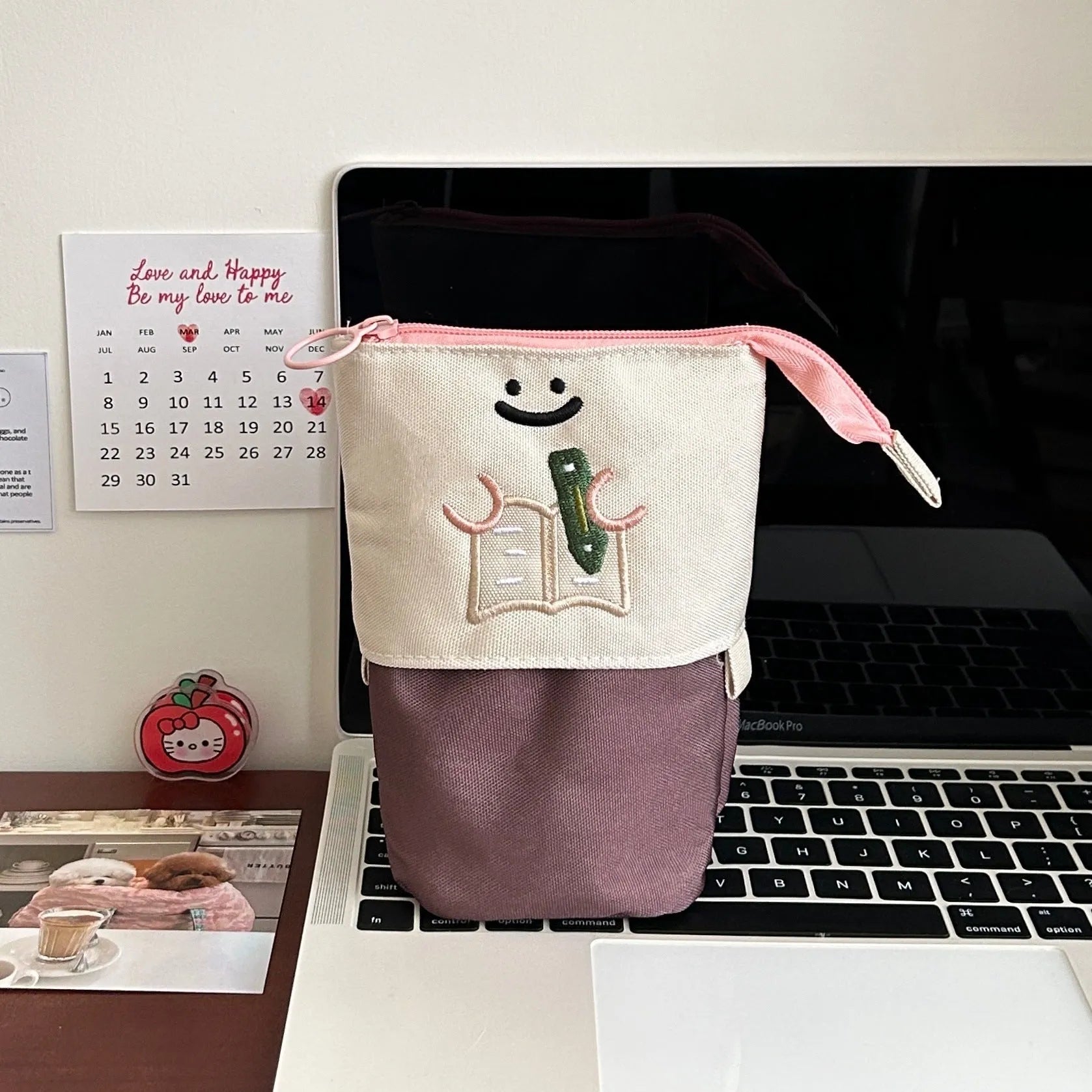 Cartoon design collapsible pencil case in brown or green Oxford fabric, shown open to display large 17cm x 14cm storage capacity.
