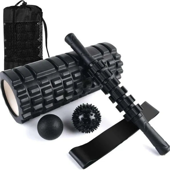 Black fitness foam roller massage bar measuring 33cm long on a plain background.
