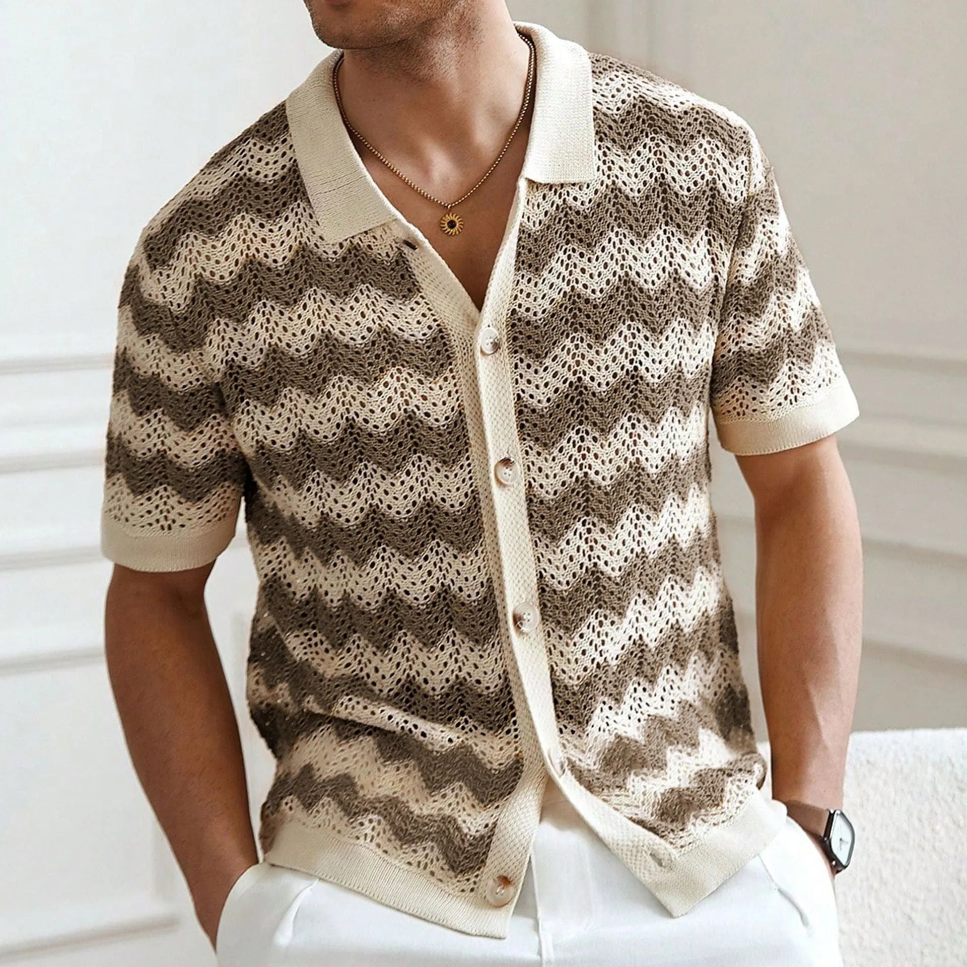 American-style hollow jacquard corrugated short-sleeve sweater in blue, shown on a hanger.
