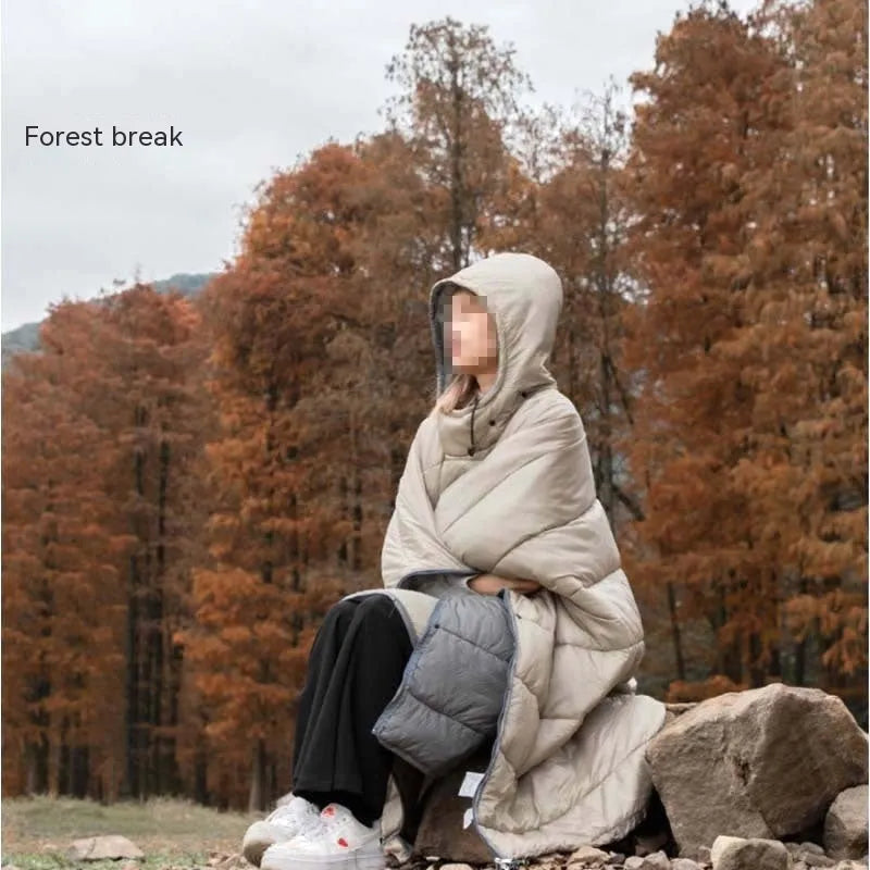 Army green outdoor cloak sleeping bag with wearable design shown in both cloak and sleeping bag configurations