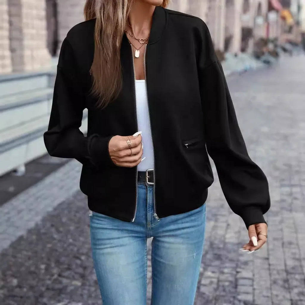 Black women's casual zip jacket with faux pockets and long sleeves