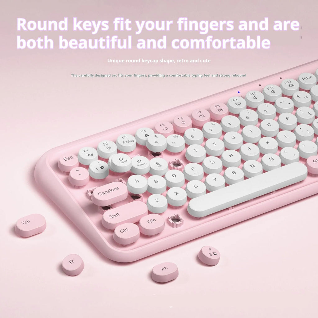 Pink Bluetooth wireless keyboard with 84 keys showing compact design
