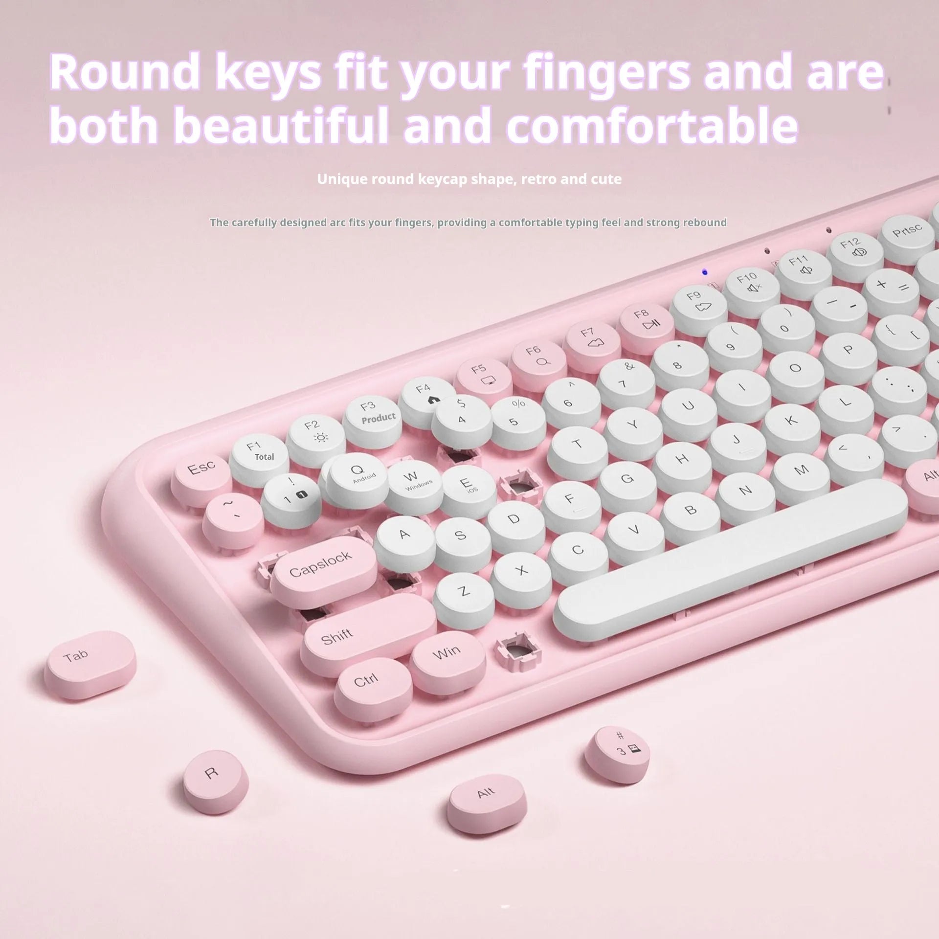 Pink Bluetooth wireless keyboard with 84 keys showing compact design