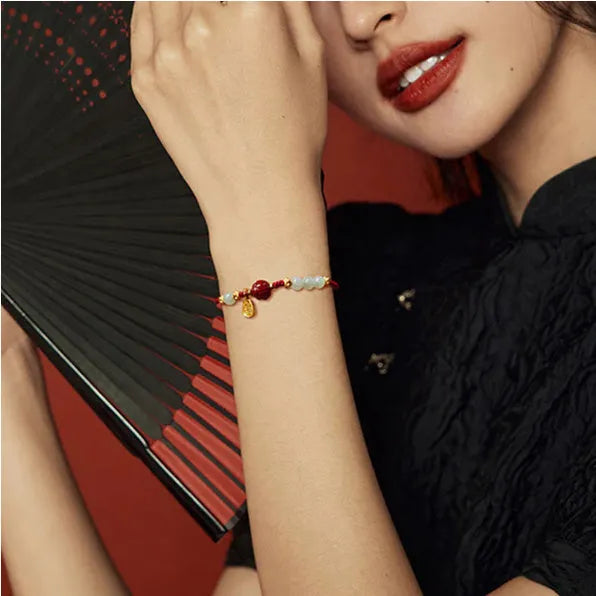 Women's adjustable bracelet with Hetian jade, cinnabar and red rope on 925 silver chain